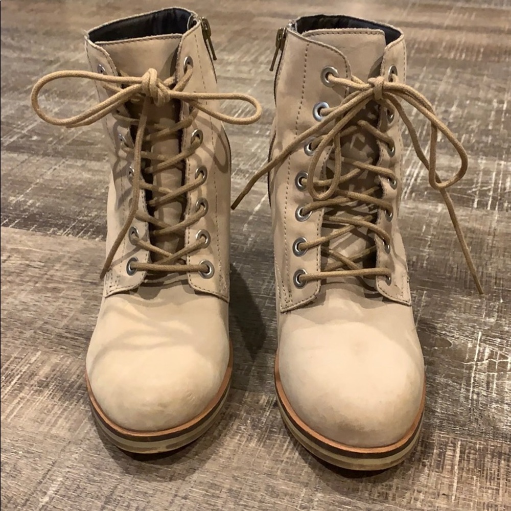 Aldo tan lace up bootie, distressed design.